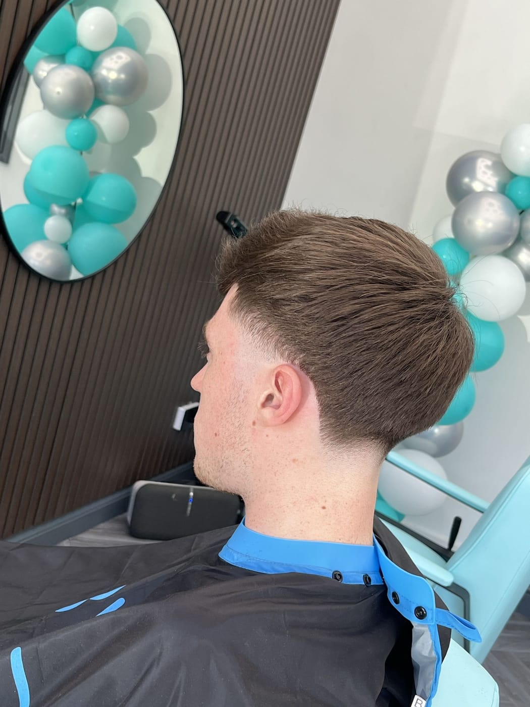 A taper fade with a textured top