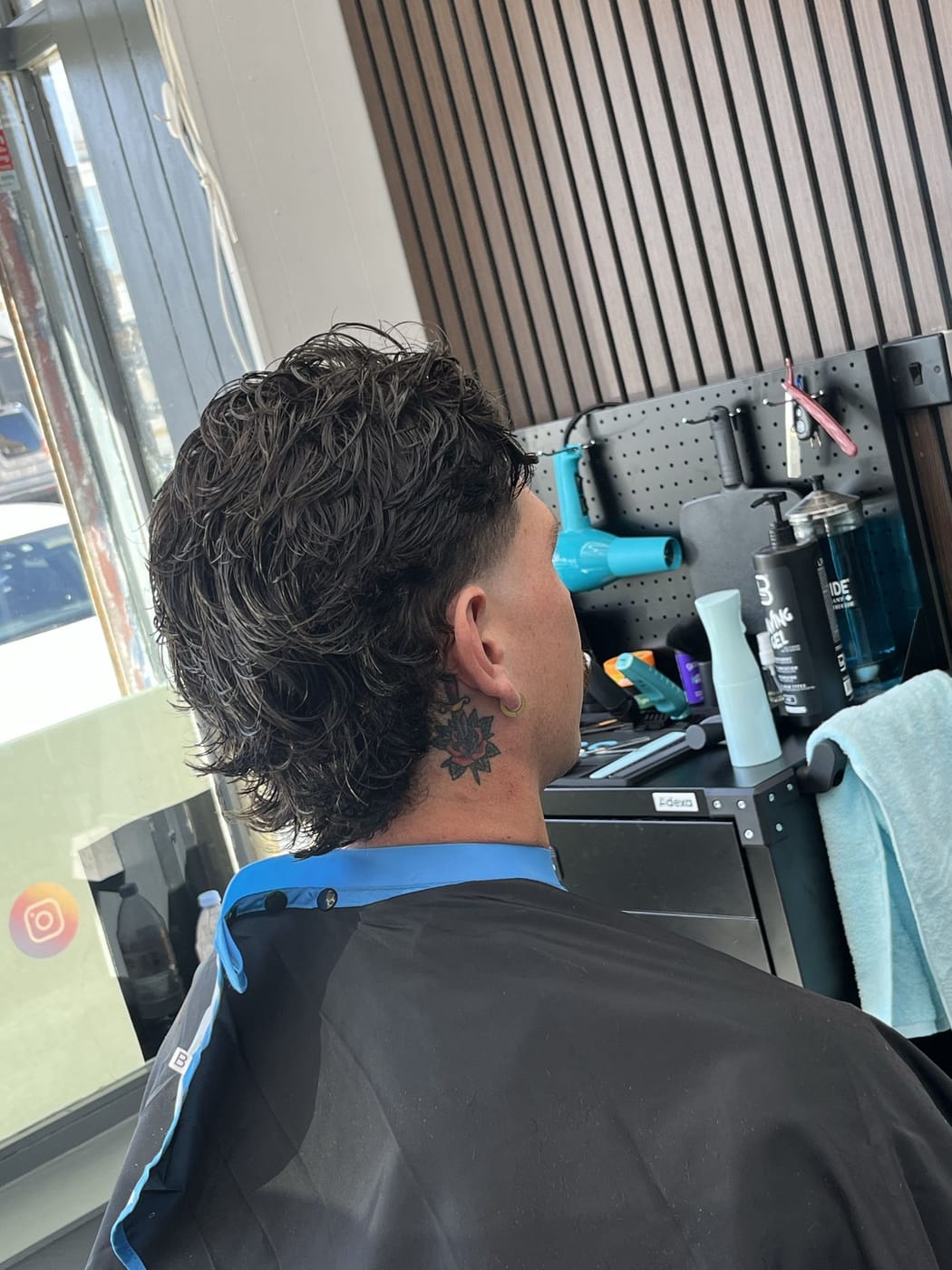 A modern mullet with faded sides